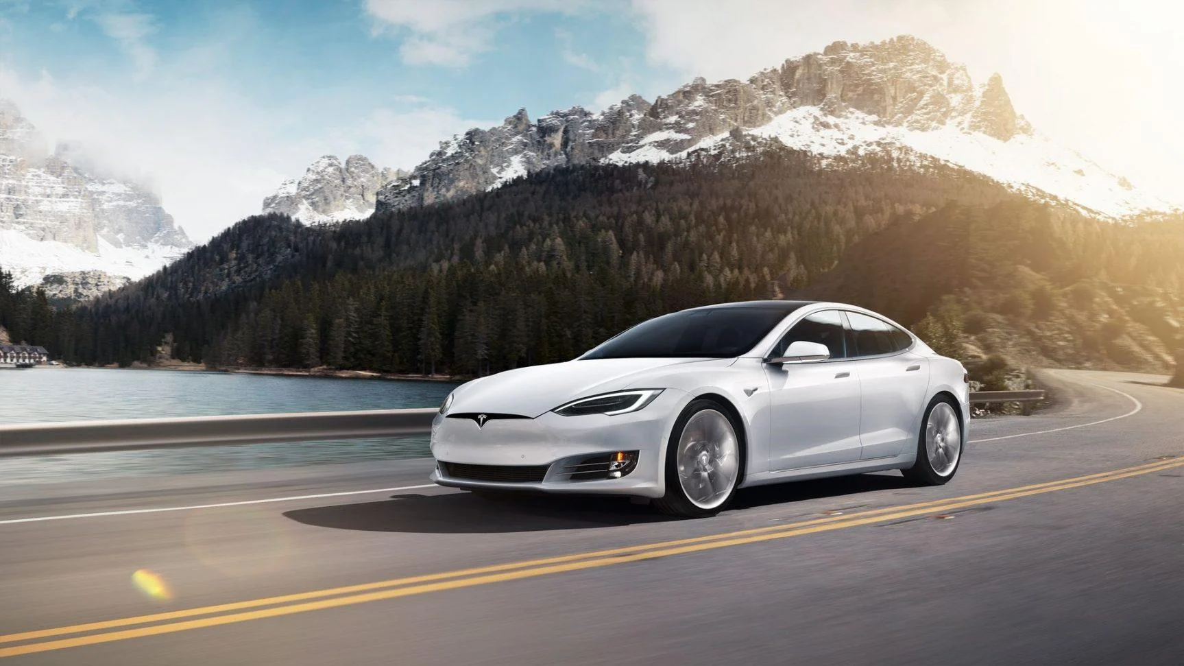 White Tesla Model S on the open road